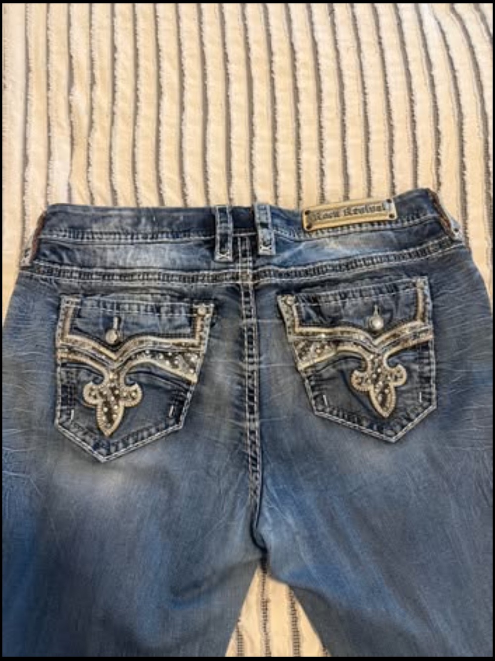 Rock Revival Women's Distressed Blue Denim Jeans with Embellished Pockets
